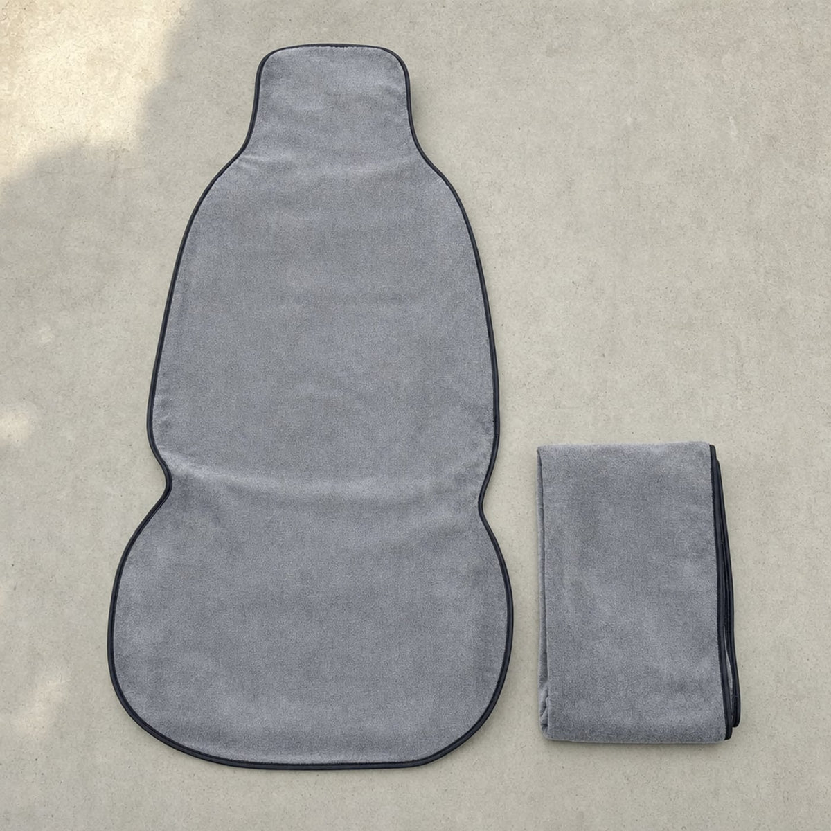 The seat towel laid flat and folded